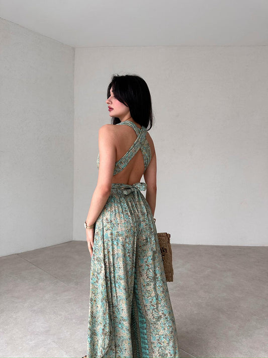 The HARPSTER Jumpsuit with Low-cut Back.